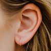 rose gold 21g twist Endless Hoop Earrings on ear