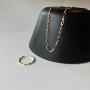 displayed Figaro anklet and toe ring